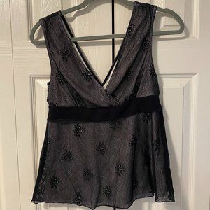 Charlotte Russe L tank white with black lace on top.